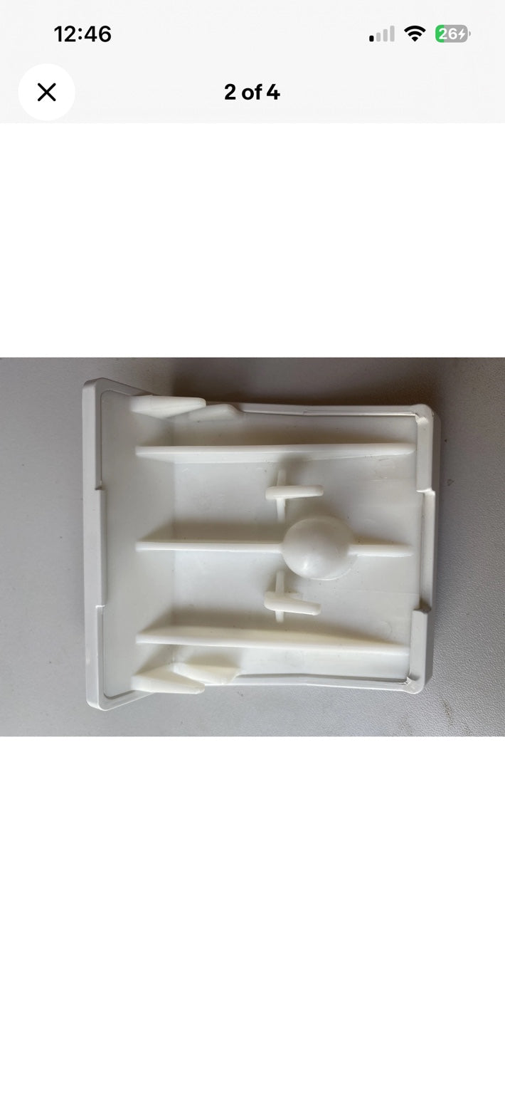 Rear fitting of Villeroy & Boch white PUSH overflow cover