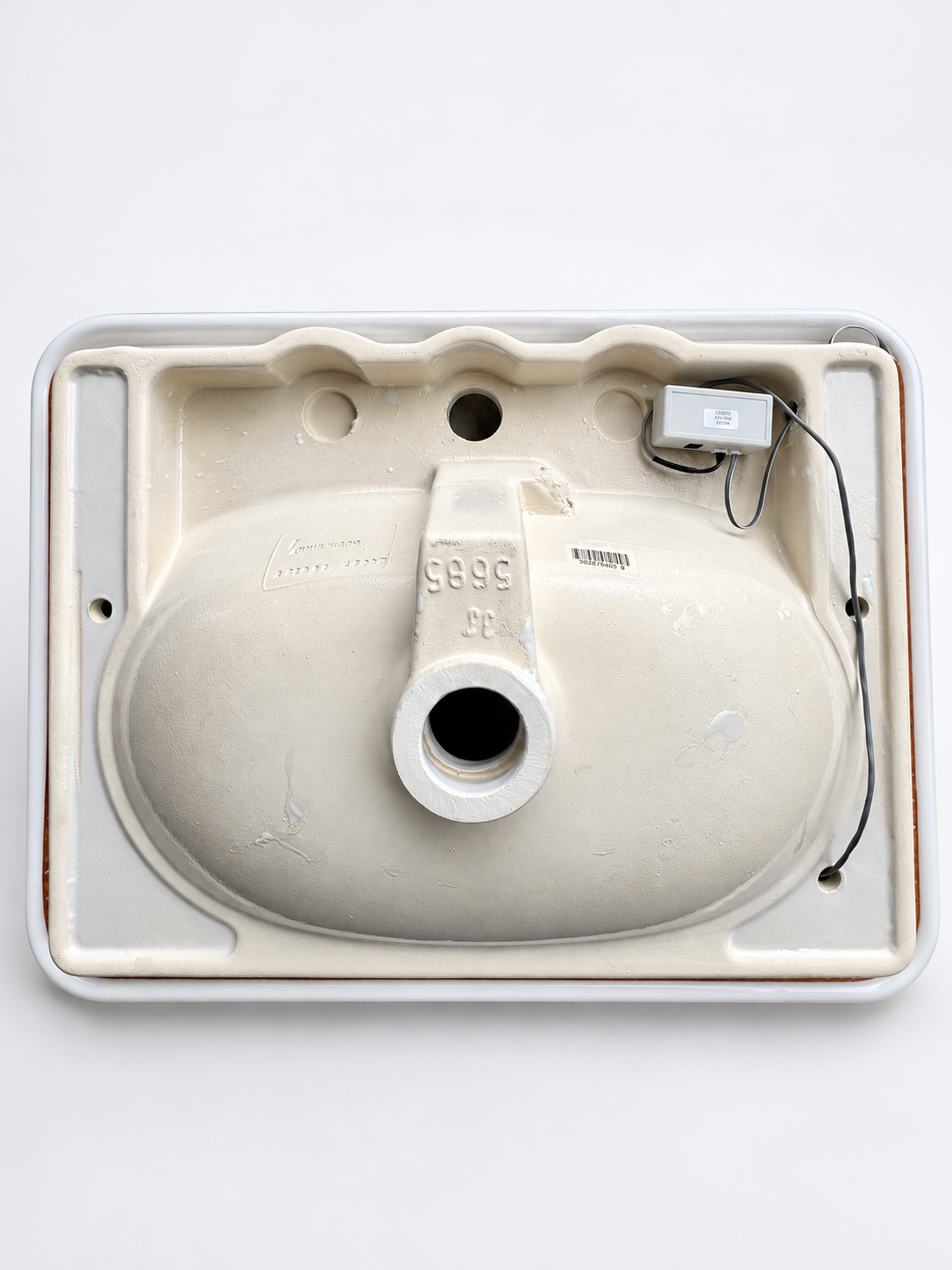 VitrA Nest basin underside with LED strip and controller