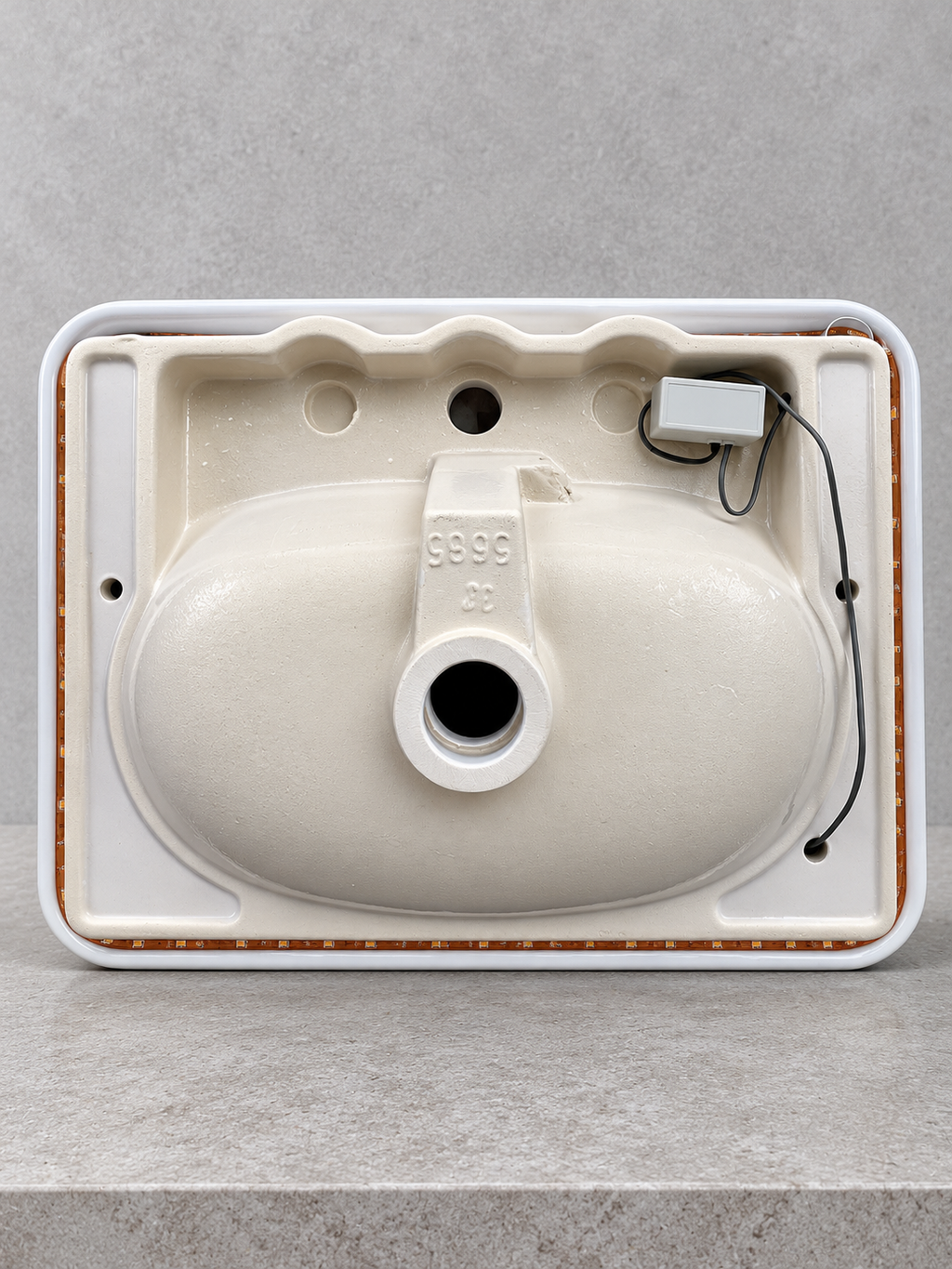 VitrA basin underside with perimeter LED strip and controller